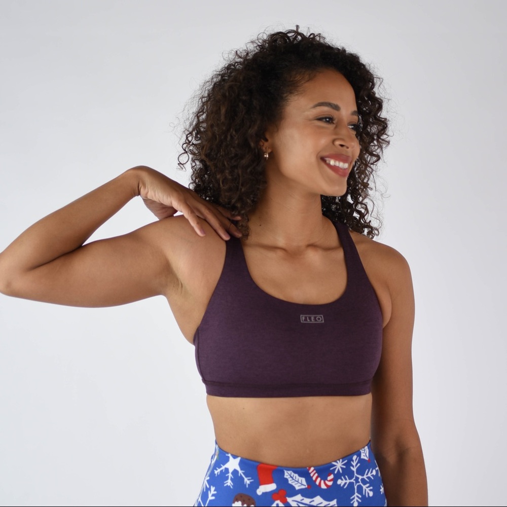 BRAND NEW! Purple sports bra. Women’s large!